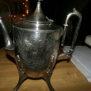antique fancy silver plate tea pot.